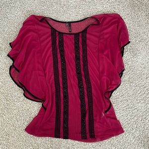 Maurice’s sheer magenta top